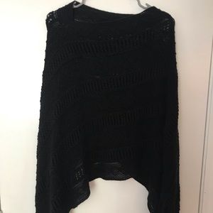 Knit poncho.